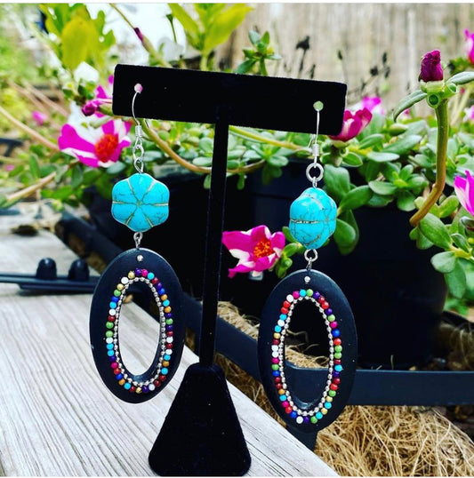 Exotic blue and black dangling earrings