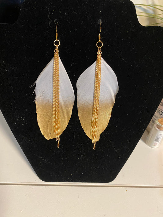 Gold and white feather earrings